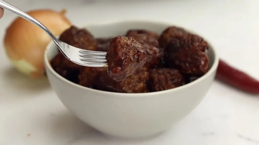 Meatballs with grape jelly and chili sauce