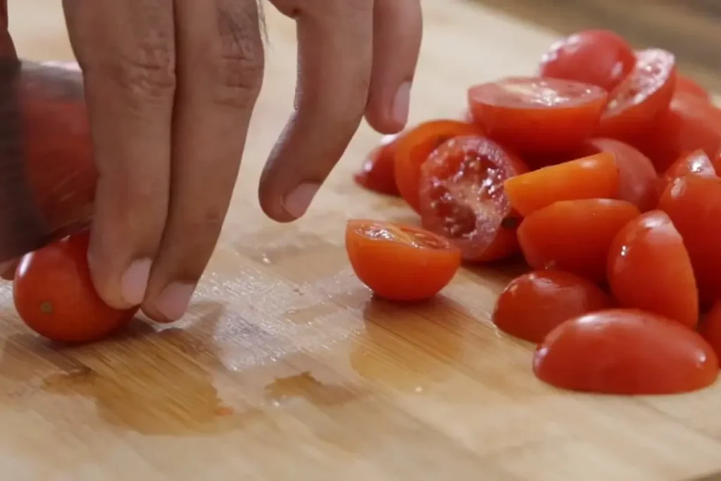 cut tomatoes for the recipe