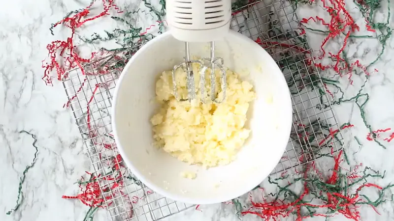 mixing butter and sugar with mixer