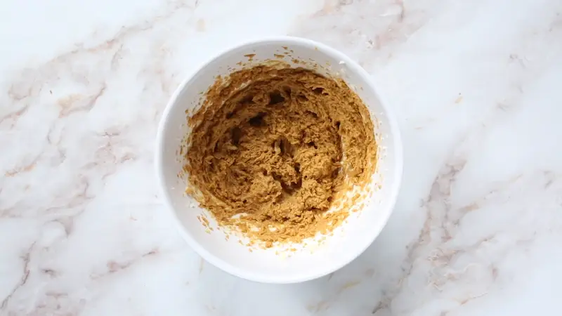 mixing wet ingredients of Chocolate Ginger Molasses Cookies