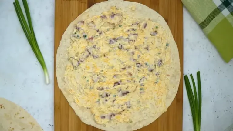 spread the cheese and mixture over tortilla for Turkey Pinwheels